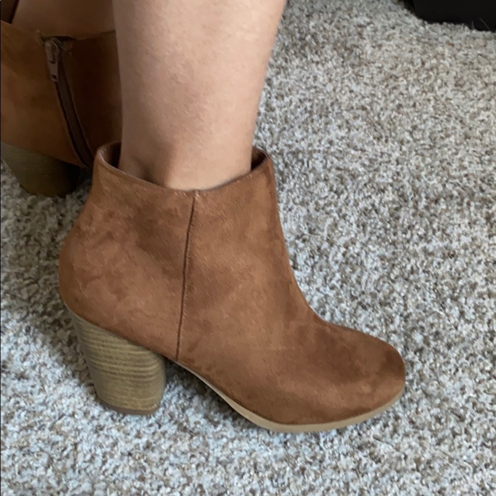 Brown heeled zip up booties